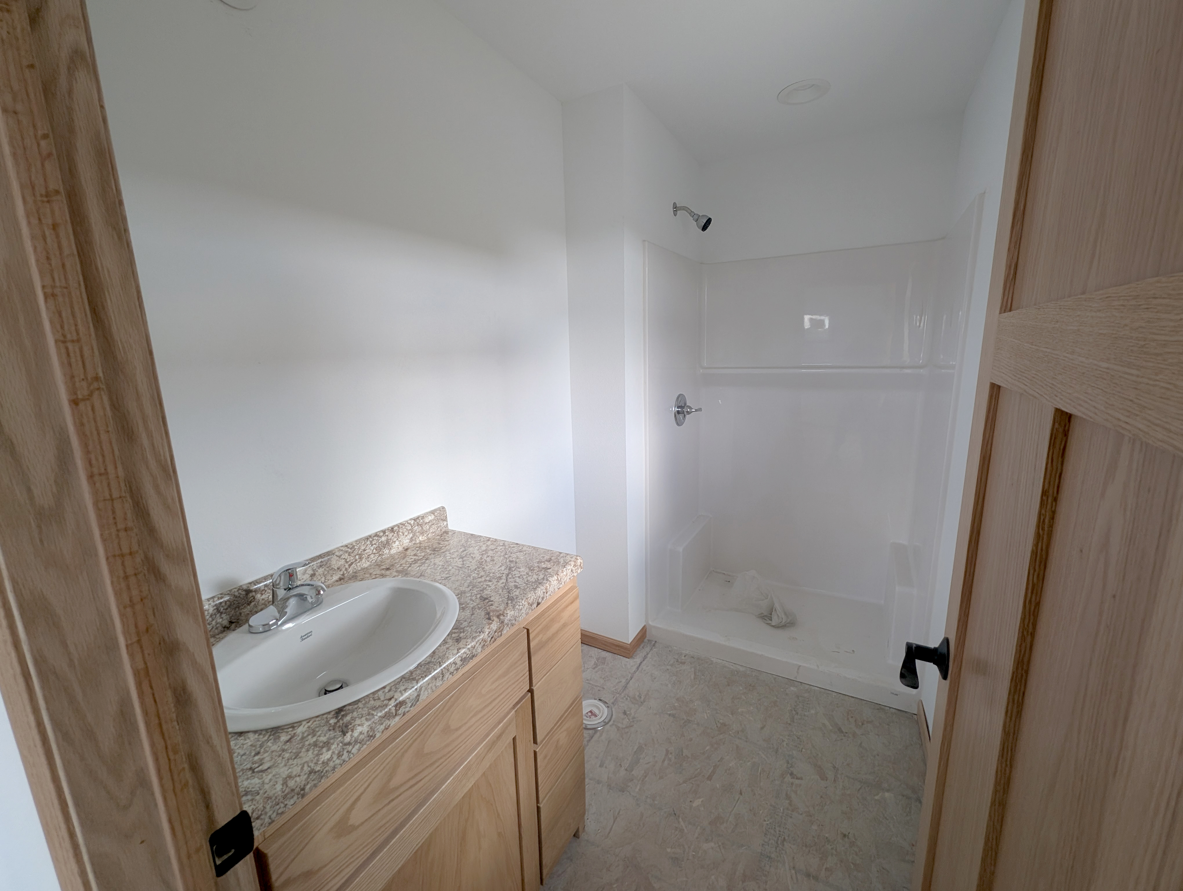 3/4 bath en-suite attached to bedroom 3.