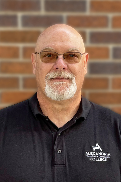 Headshot of Ron Schwint wearing black shirt 
