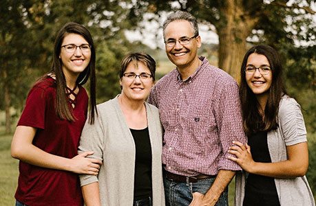 Randy Meyer with his wife Joan and two daughters