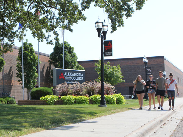 Students Walking in Front of Campus